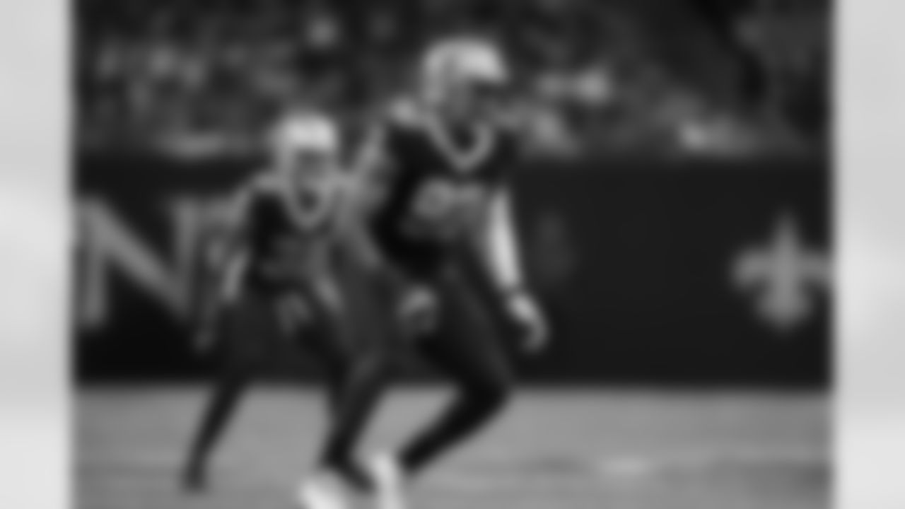 Check out photos of New Orleans Saints defensive end Marcus Davenport in action throughout the 2022 season.