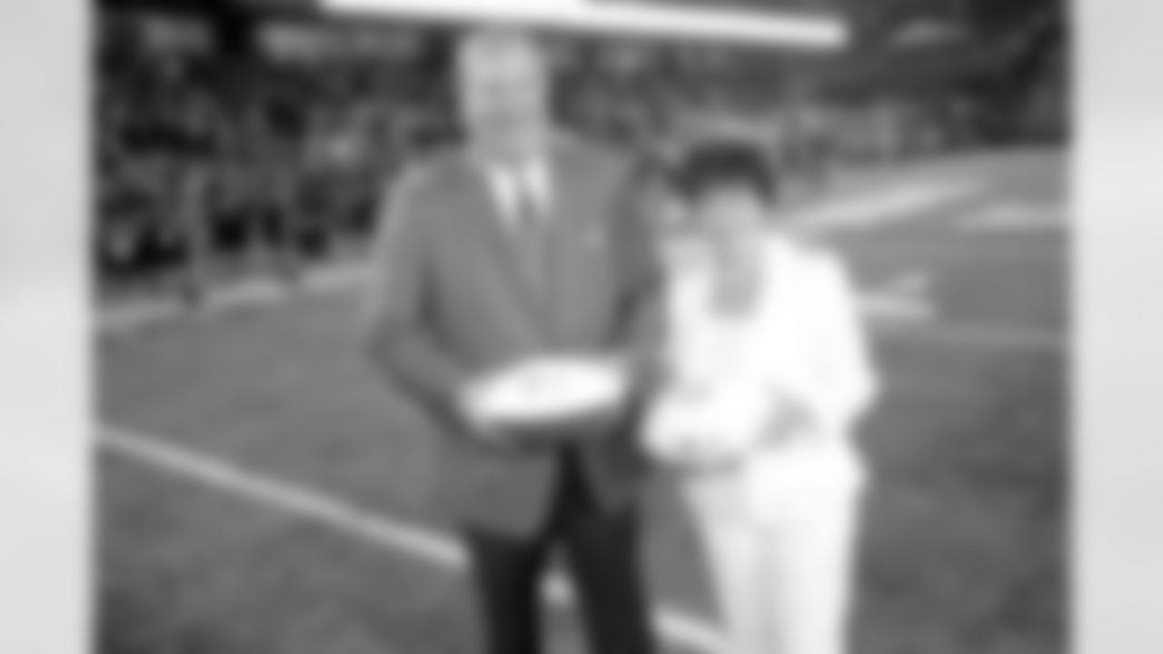New Orleans Saints owner Gayle Benson and team president Dennis Lauscha presented the game balls during the LHSAA Football Championship Division I game on December 4, 2021. The Catholic-B.R. Bears defeated the Jesuit Football Team 14-10 at Yulman Stadium.