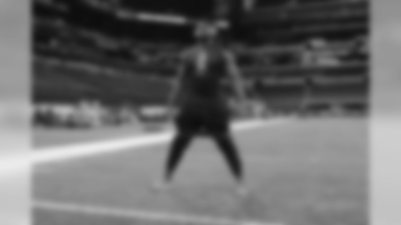 Kansas tackle Hakeem Adeniji warms up during the 2020 NFL Scouting Combine, Friday, Feb. 28, 2020 in Indianapolis. (Logan Bowles/NFL)