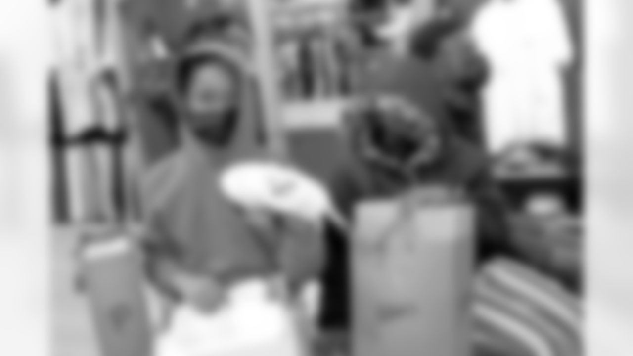 New Orleans Saints defensive end Cameron Jordan gifted dozens of kids from the Youth Empowerment Project (Y.E.P) with a pair of sneakers of their choice at Sneaker Politics in the French Quarter on Thursday, December 16, 2021.
