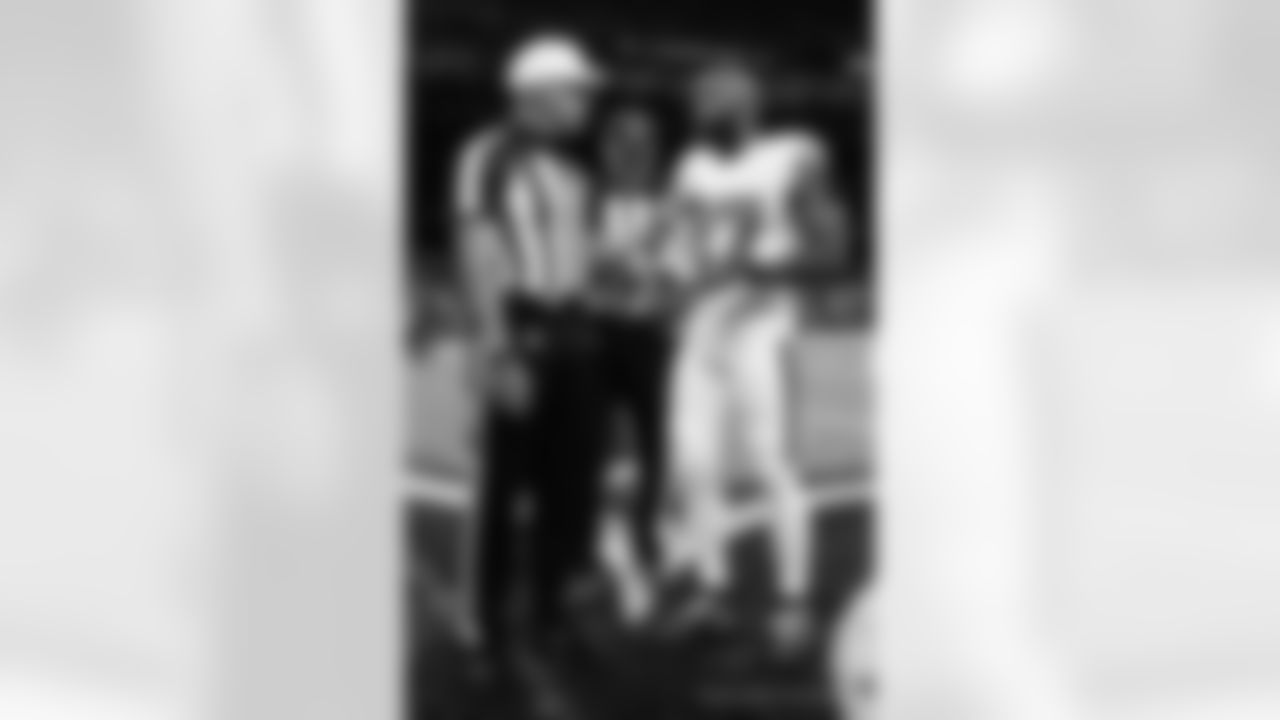 New Orleans Saints players and coaches prepare to take on the Tampa Bay Buccaneers in Week 8 of the 2021 NFL season.