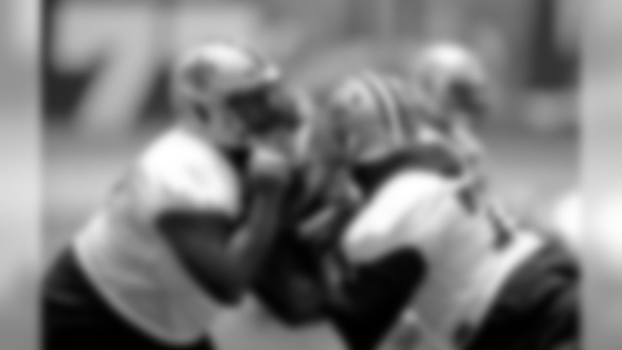 New Orleans Saints offensive guard Marshall Newhouse (77) and offensive tackle Terron Armstead (72) work out during training camp practice at the team's headquarters in Metairie on Monday, August 19, 2019.