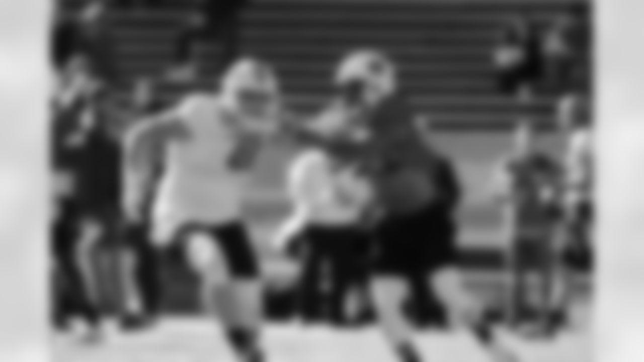TE Troy Fumagalli (L) and ILB Tre' Williams (R)