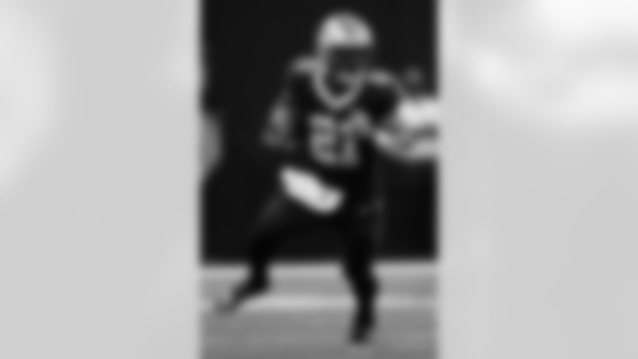 Check out the game action from the New Orleans Saints game against the Tennessee Titans in Week 1 of the 2023 NFL season including running back Jamaal Williams (21).