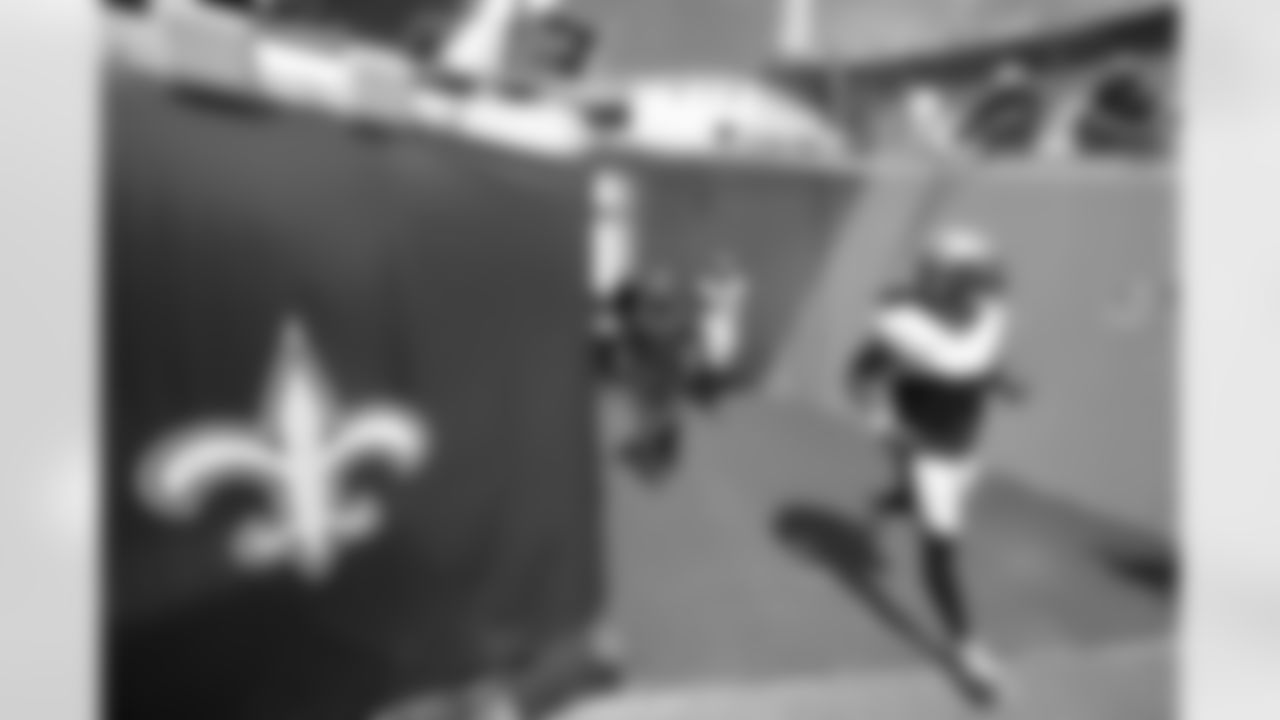 The New Orleans Saints prepare to take on the Green Bay Packers during pregame warmups at TIAA Bank Field in week 1 of the 2021 NFL season on Sunday, September 12, 2021.