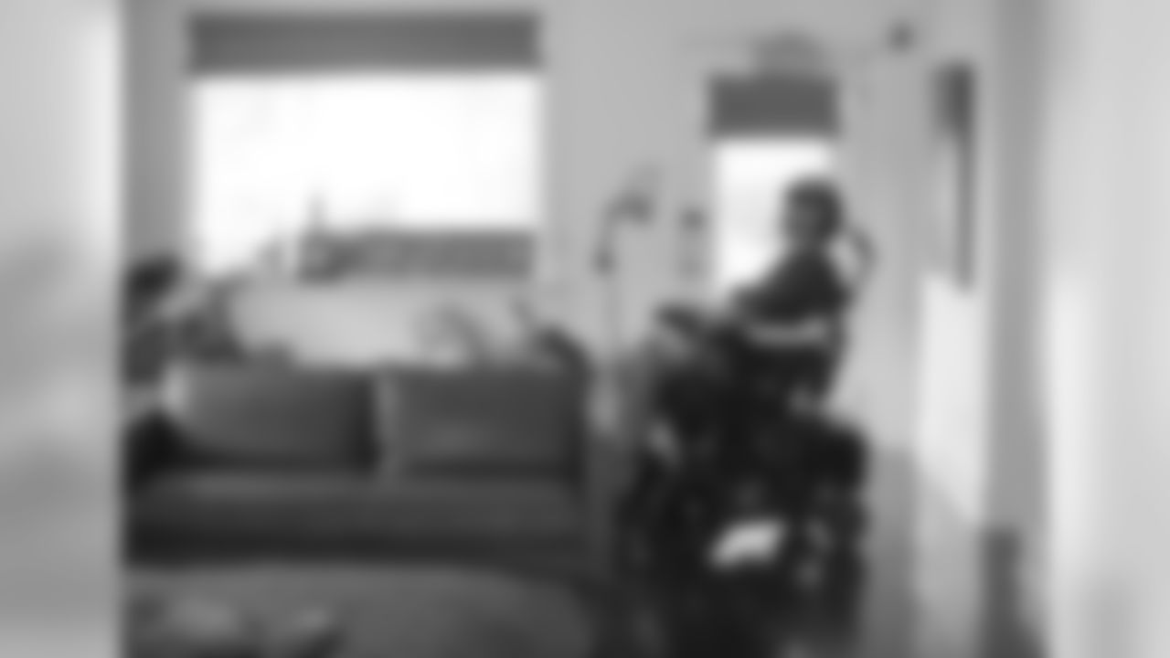 While Michel Gleason gets dressed, Steve entertains Gray with a buckled-in joy ride around the house.