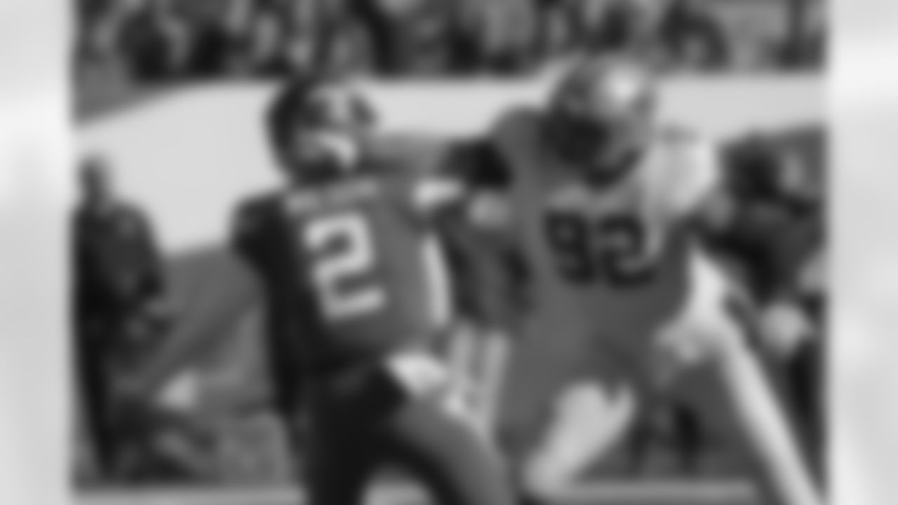Check out photos of New Orleans Saints defensive end Marcus Davenport in action during the 2021 NFL season.