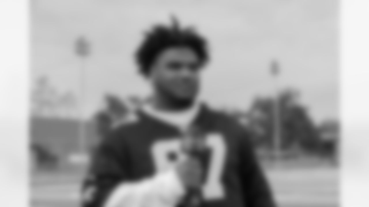 New Orleans Saints Malcom Roach teamed up with John Fayard Moving to donate $5000 worth of new football equipment to Fisher High School after the devastation caused by Hurricane Ida last year to their school and football program.