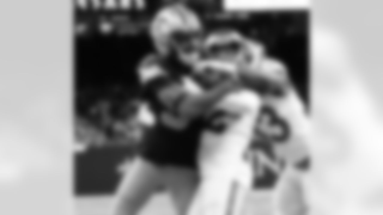 New Orleans Saints players in action during their 2022 Week 11 game against the Los Angeles Rams.