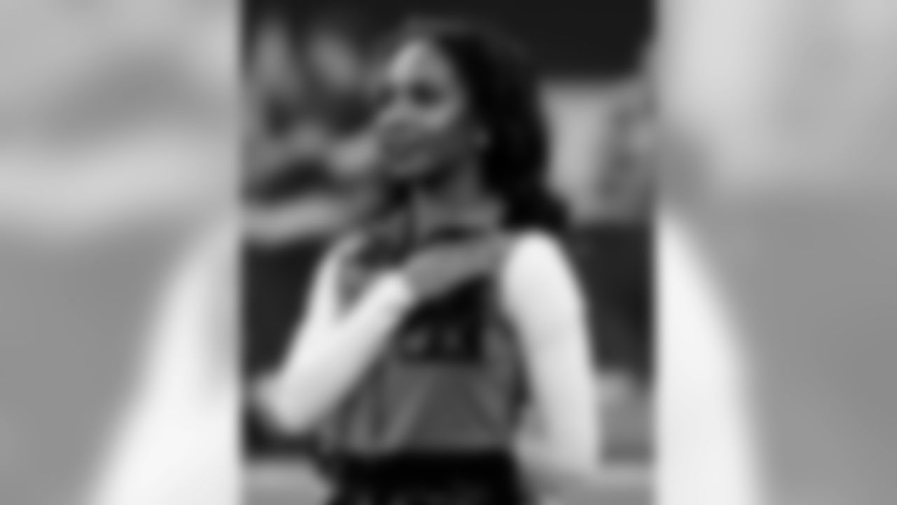 Check out photos of Saintsations member Deneé in action during 2019 Saints NFL season.