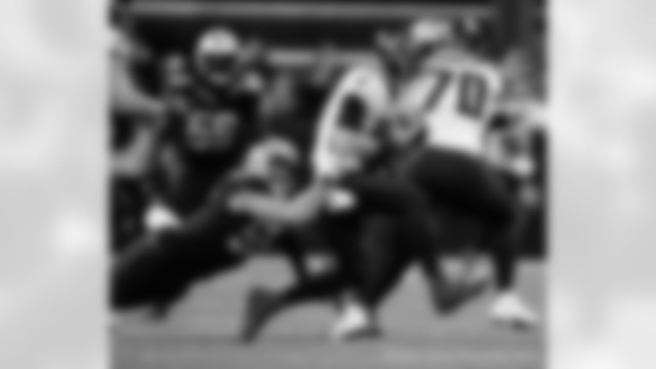 New Orleans Saints players in action during their 2022 Week 15 game against the Atlanta Falcons.