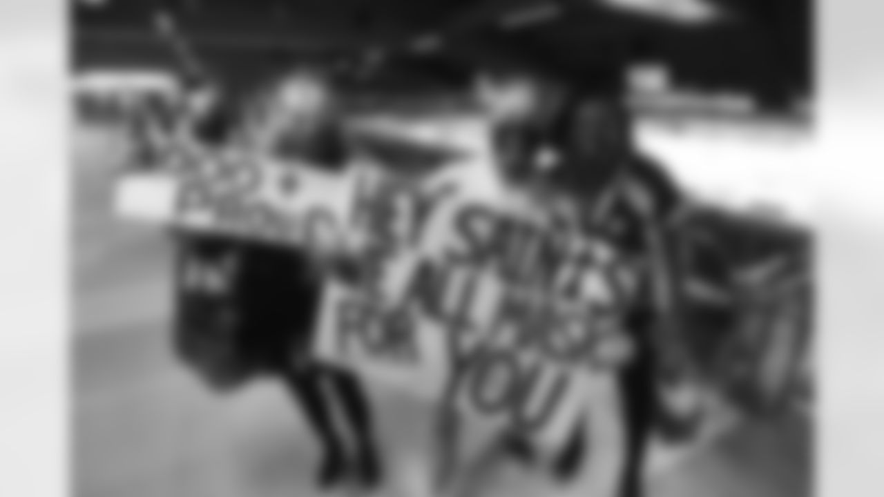 New Orleans Saints fans and cheer on the team from inside the Mercedes-Benz Superdome against the Carolina Panthers in Week 7 of the 2020 NFL season.