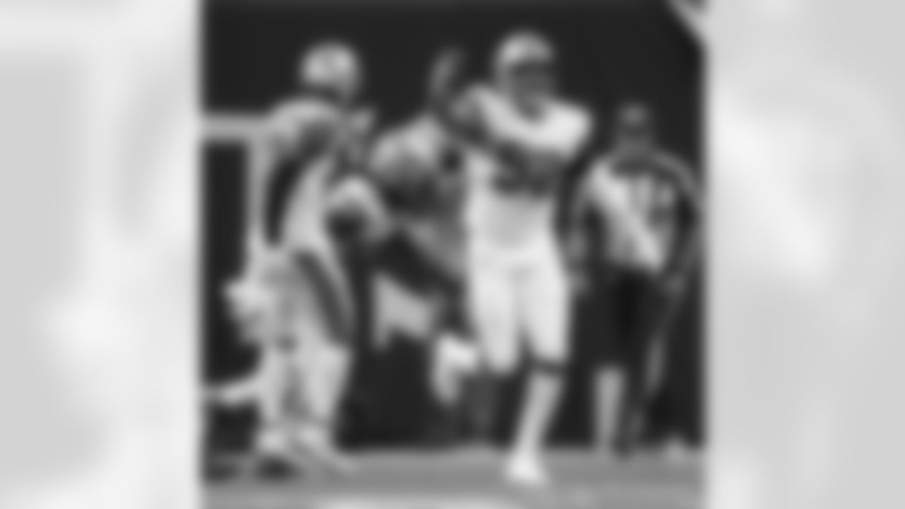 Check out photos of New Orleans Saints defensive end Marcus Davenport in action during the 2021 NFL season.