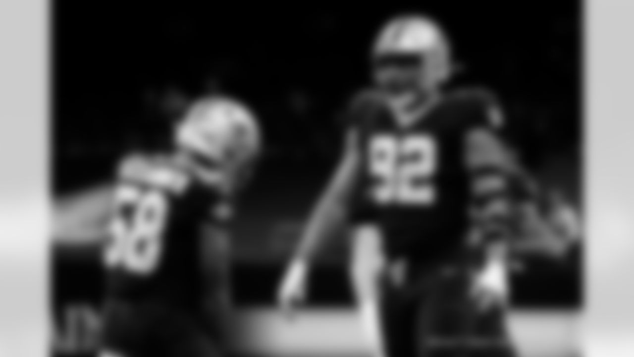 Check out photos of New Orleans Saints defensive end Marcus Davenport in action during the 2020 NFL season.