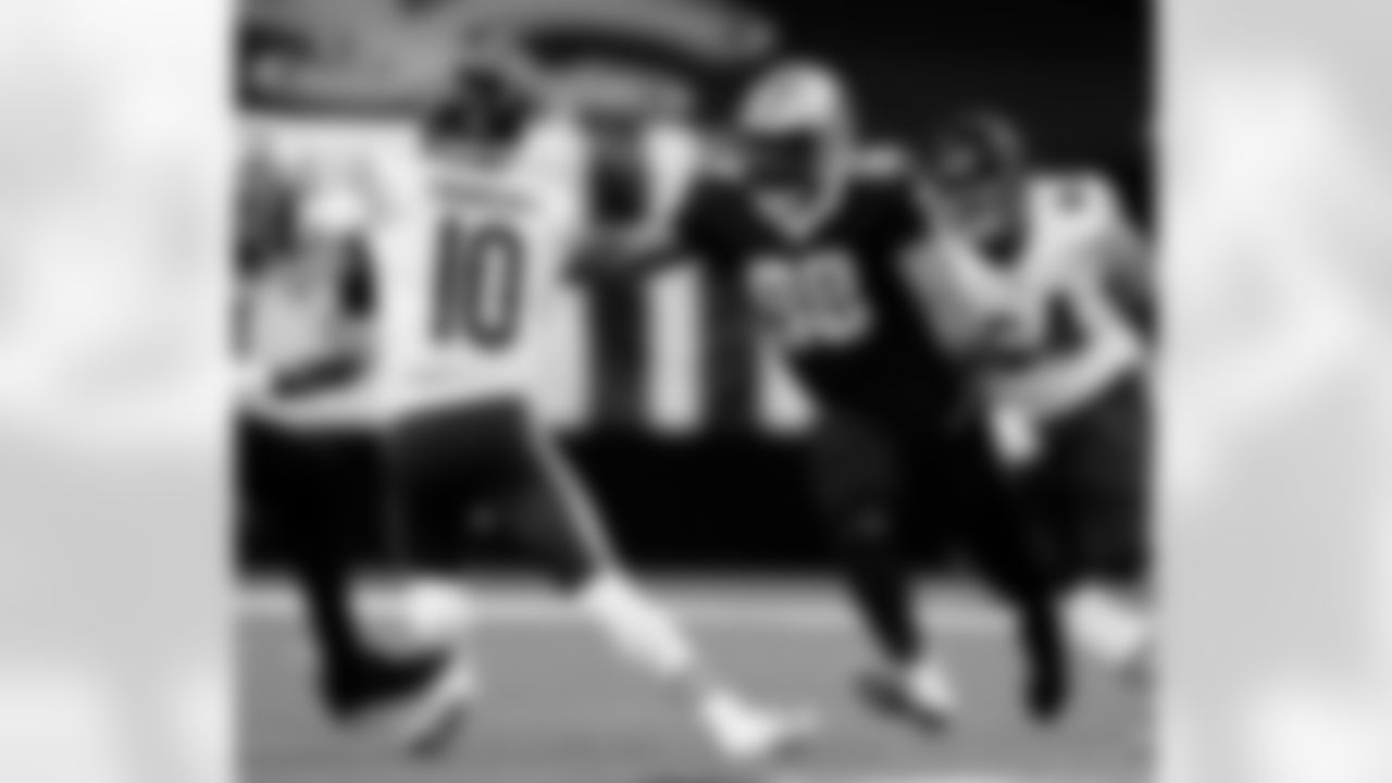 Game action photos from the New Orleans Saints vs. Chicago Bears matchup in the Wild Card round of the 2020 NFL playoffs.