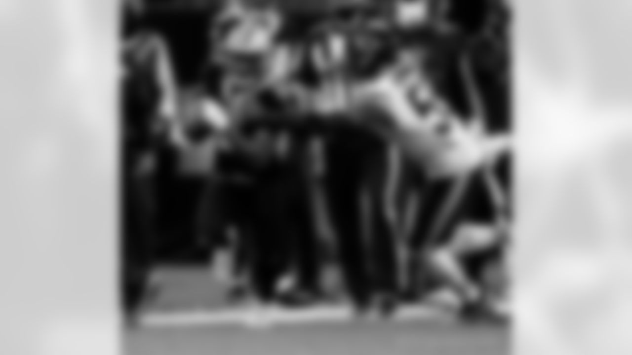 Game action photos from the New Orleans Saints vs. Chicago Bears matchup in the Wild Card round of the 2020 NFL playoffs.