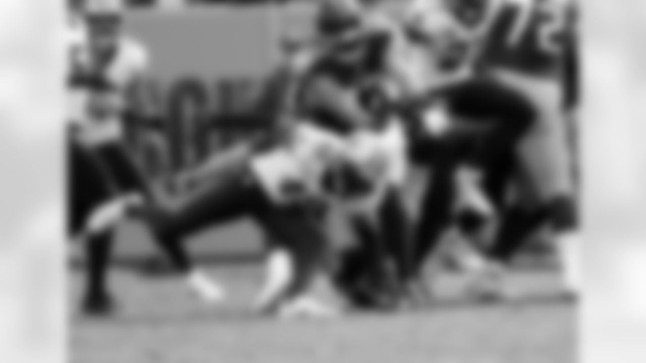Check out photos of New Orleans Saints special teams ace J.T. Gray in action during the 2021 NFL season.
