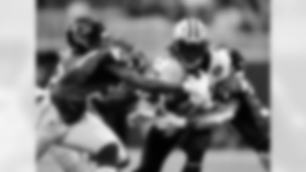 Revisit the NFC South rivalry with a look at some of the best photos of the New Orleans Saints vs. Atlanta Falcons matchups through the years.