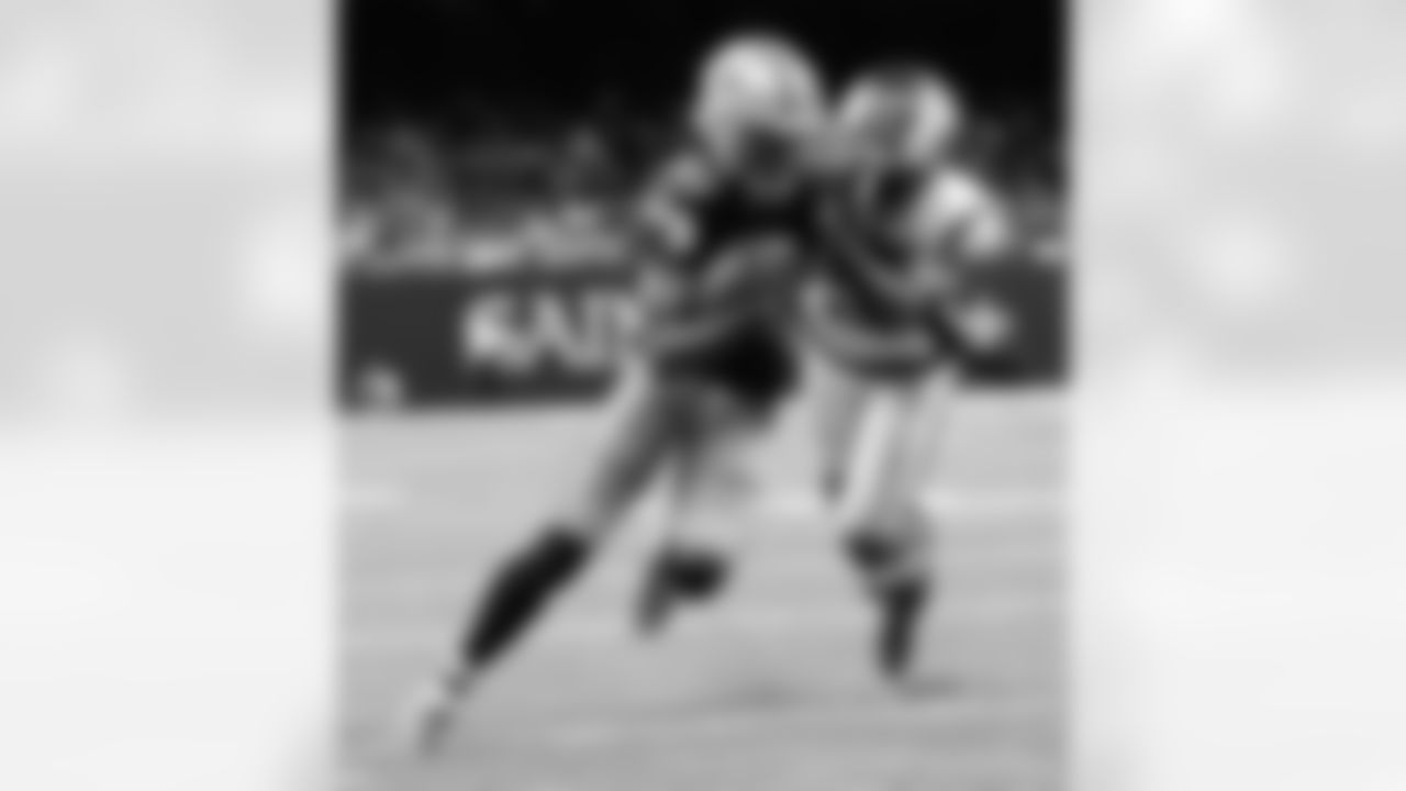 New Orleans Saints players in action during their 2022 Week 11 game against the Los Angeles Rams.