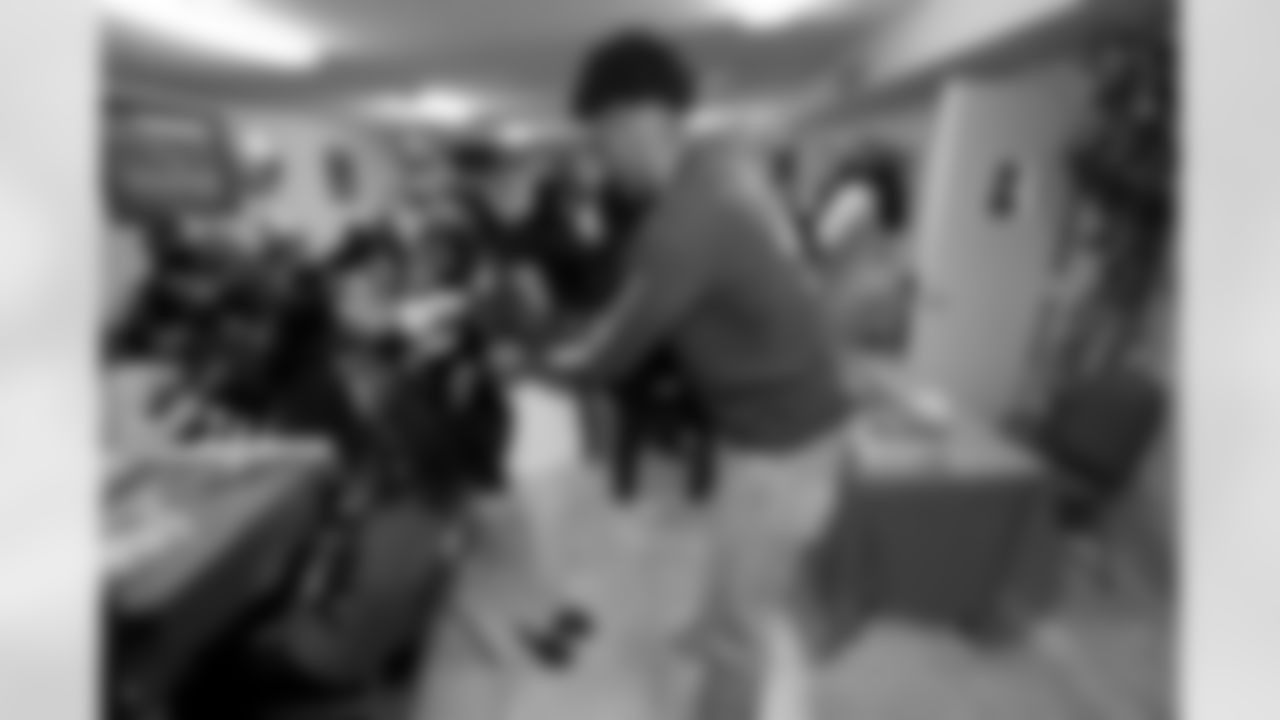 New Orleans Saints wide receiver Michael Thomas held a gift-giving event for dozens of kids from the Youth Group at the Holy Faith Temple Church in Treme on December 20, 2022.
