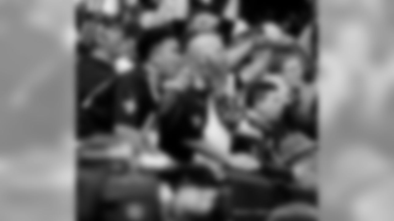 New Orleans Saints fans cheer on the team against the Minnesota Vikings at the Mercedes-Benz Superdome.