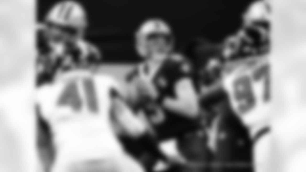 Revisit the NFC South rivalry with a look at some of the best photos of the New Orleans Saints vs. Atlanta Falcons matchups through the years.