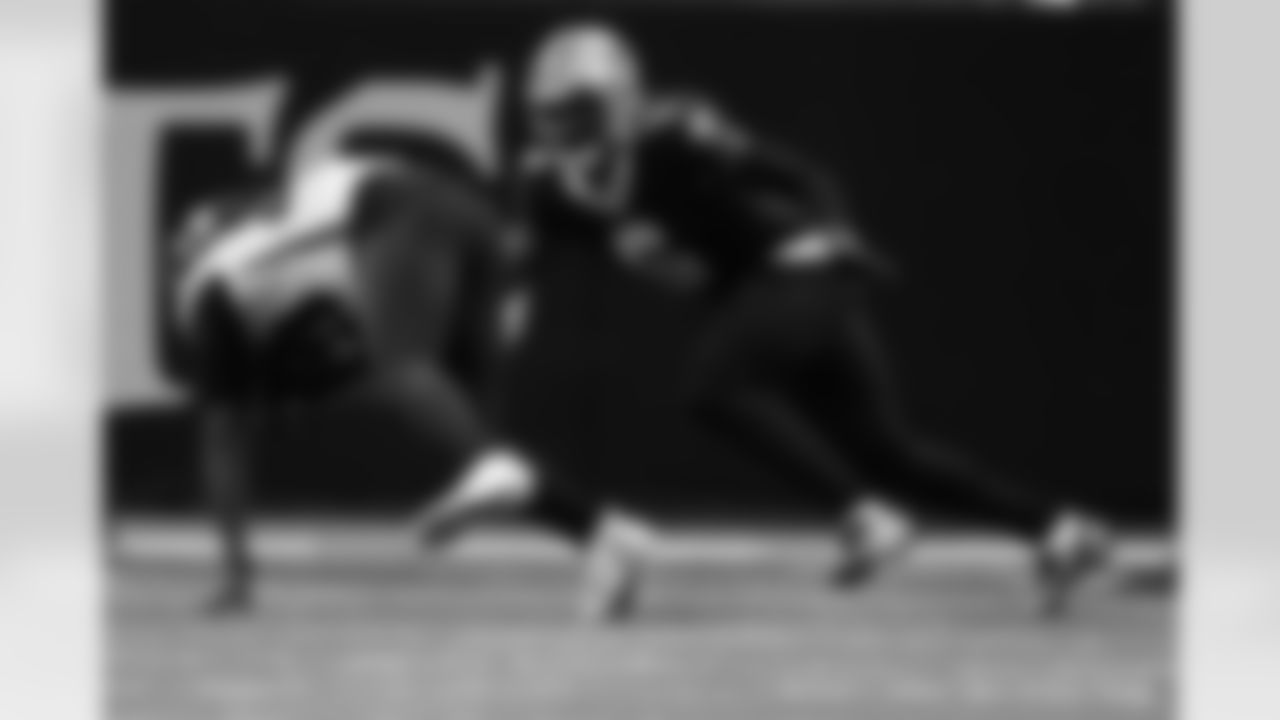 New Orleans Saints players in action during their 2022 Week 15 game against the Atlanta Falcons.