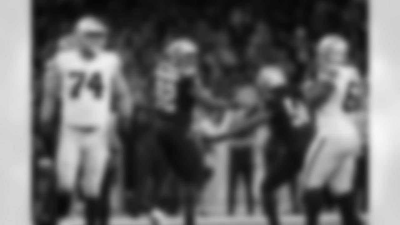 Check out photos of New Orleans Saints defensive end Marcus Davenport in action throughout the 2022 season.