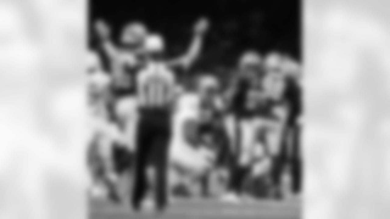 New Orleans Saints players in action during their 2022 Preseason Week 3 game against the Los Angeles Chargers.