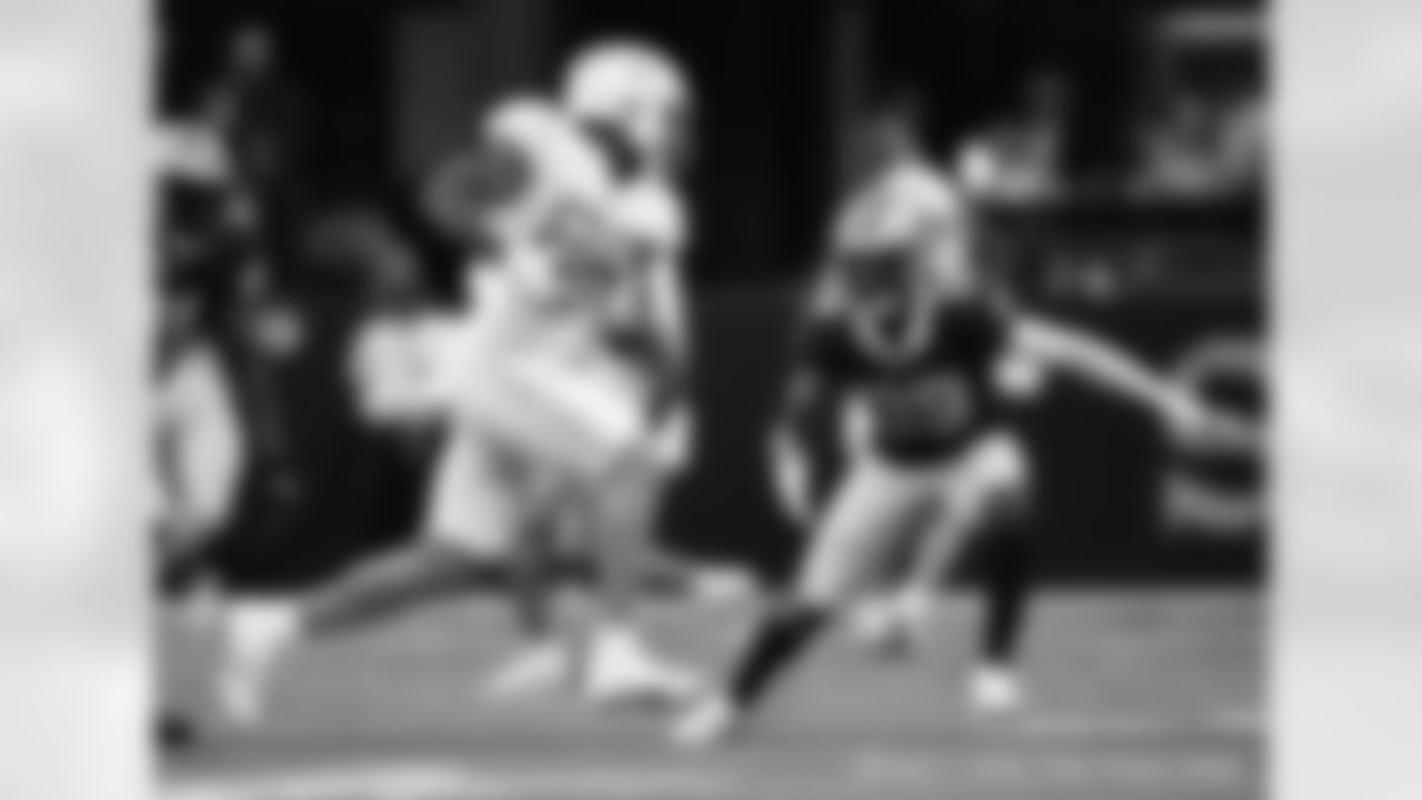 New Orleans Saints players in action during their 2022 Preseason Week 3 game against the Los Angeles Chargers.