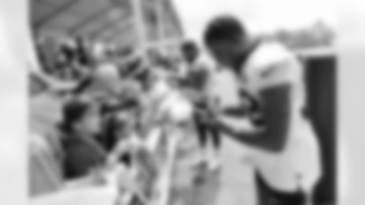 New Orleans Saints defensive back Smoke Monday greets fans at the first open practice of the year at 2022 Saints Training Camp presented by Rouses Markets on Saturday, July 30 at the Ochsner Sports Performance Center.