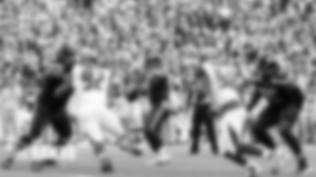 Seahawks quarterback Russell Wilson looks for an open receiver in the second half as Mike Iupati and Duane Brown provide protection.