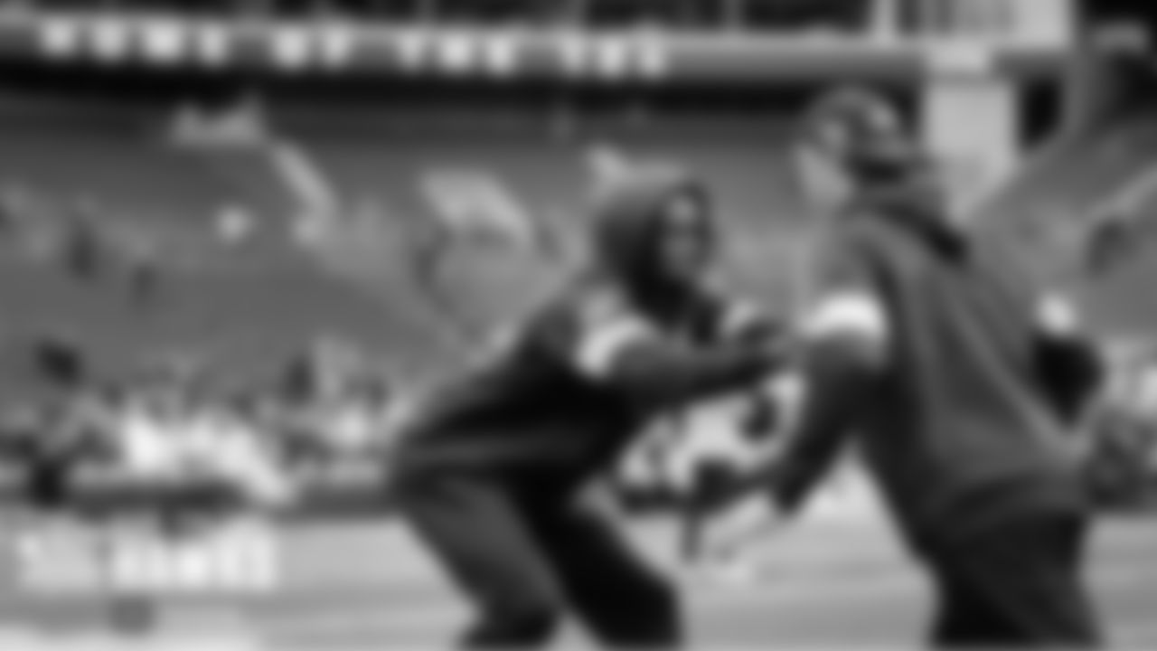 Seahawks cornerback Tre Flowers works on technique with assistant coach Nick Sorensen.