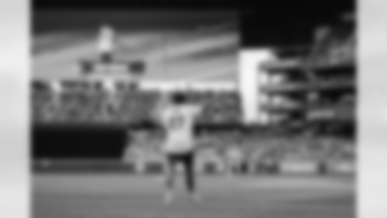 Seahawks cornerback Tariq Woolen throws out the ceremonial first pitch prior to a Mariners game at T-Mobile Park on April 23, 2023.
