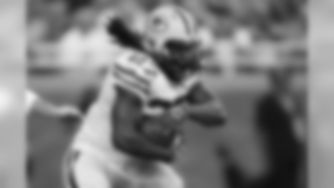 Green Bay Packers running back Eddie Lacy (27) rushes against the Detroit Lions during an NFL football game at Ford Field in Detroit, Sunday, Sept. 21, 2014. (AP Photo/Rick Osentoski)
