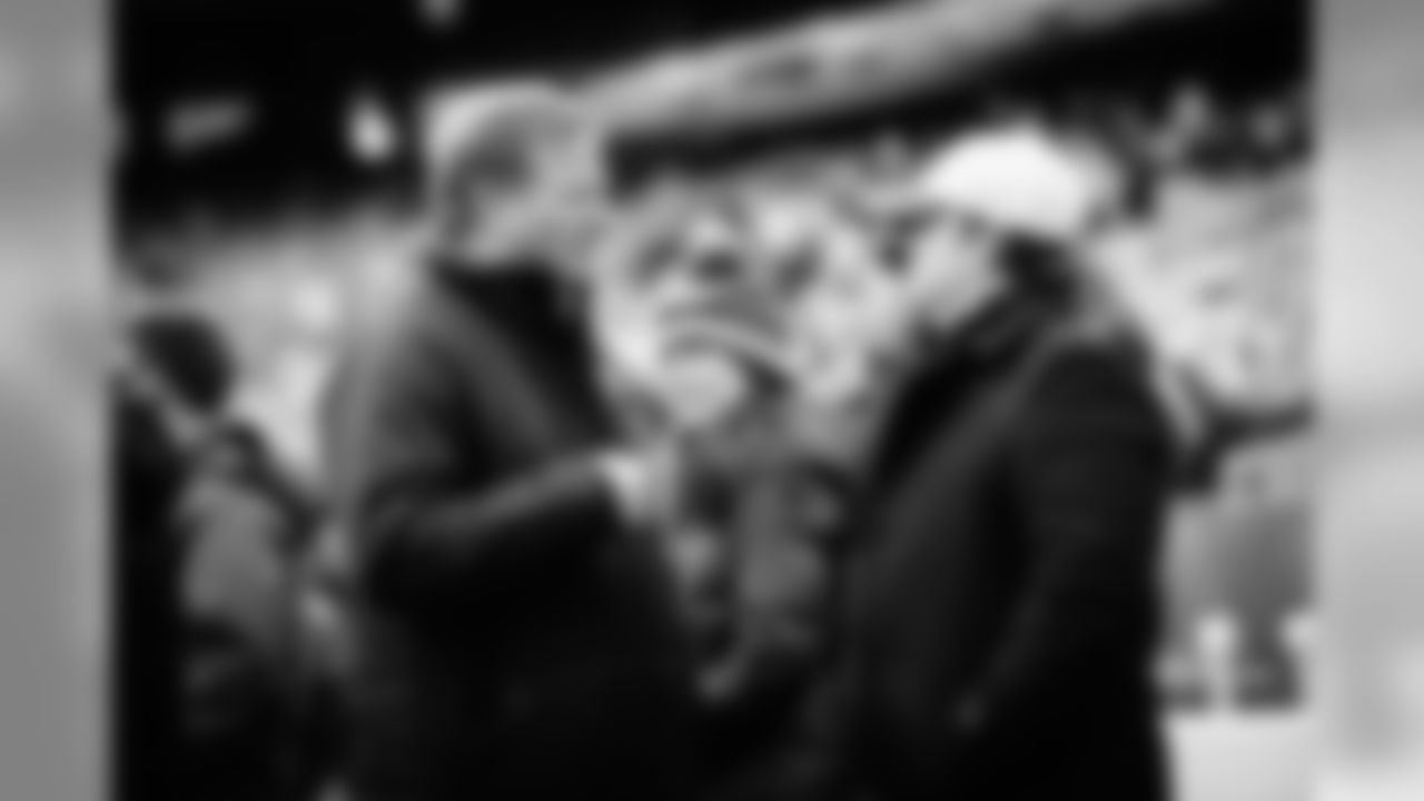 NFL commisioner Roger Goodell and Seahawks general manager John Schneider chat on the field before the game.