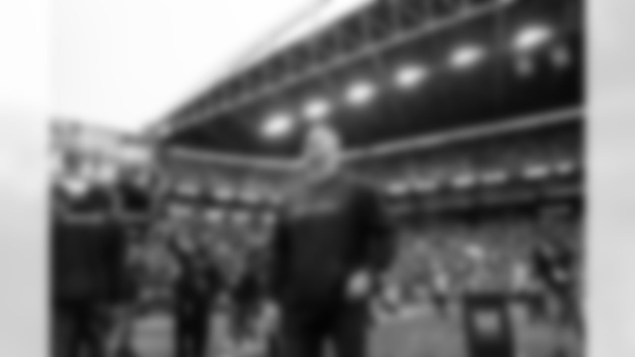 Former Seahawks punter and fan favorite Jon Ryan soaks in a standing ovation given to the Super Bowl XLVIII champs during a halftime ceremony.