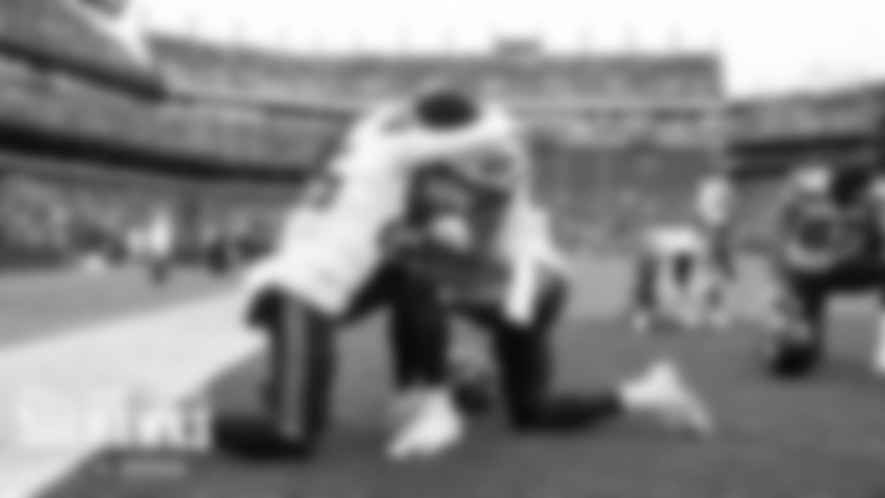 Seahawks defensive players and brothers Shaquill and Shaquem Griffin pray in the end zone after the team took the field during pregame introductions.