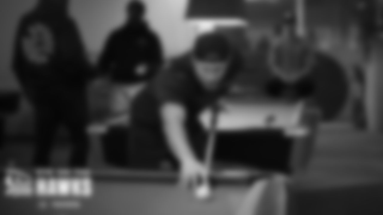 Cody Barton relaxes with some pool at the team event on Thursday evening.