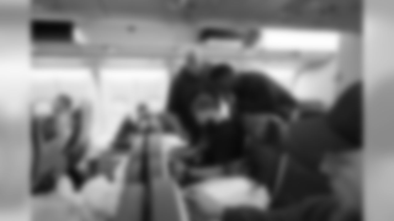 Once on the plane for the trip to Seattle, linemen Mark Glowinski and Germain Ifedi were already reviewing game video with line coach Tom Cable.