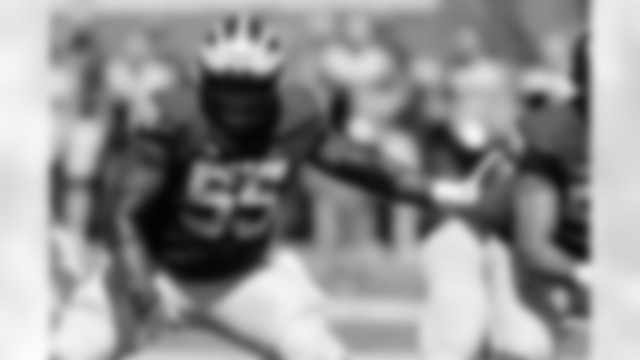 Michigan offensive lineman Olusegun Oluwatimi plays during the second half of an NCAA college football game, Saturday, Sept. 3, 2022, in Ann Arbor, Mich. (AP Photo/Carlos Osorio)