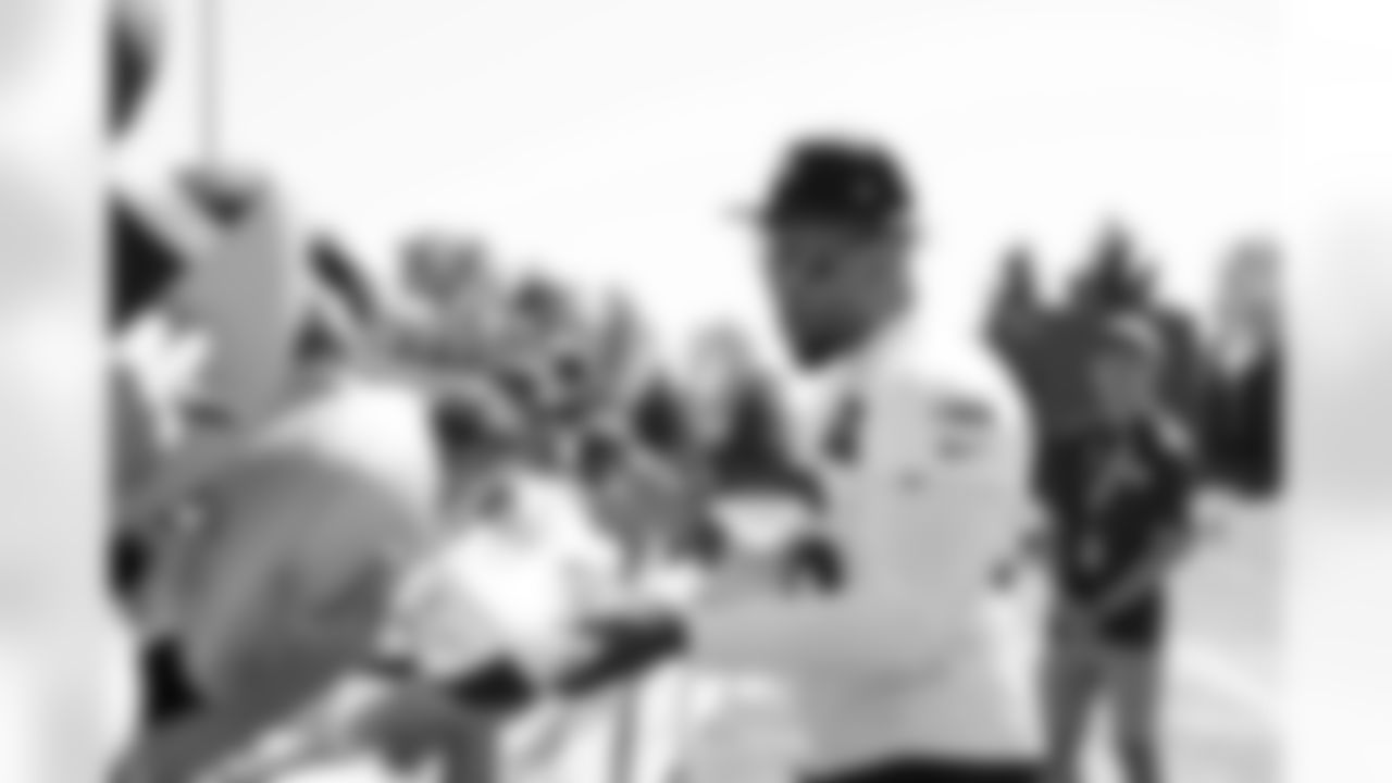Seahawks linebacker Jordyn Brooks (56) signs autographs at practice on Tuesday, August 1, 2023 at the Virginia Mason Athletic Center in Renton, Wash.