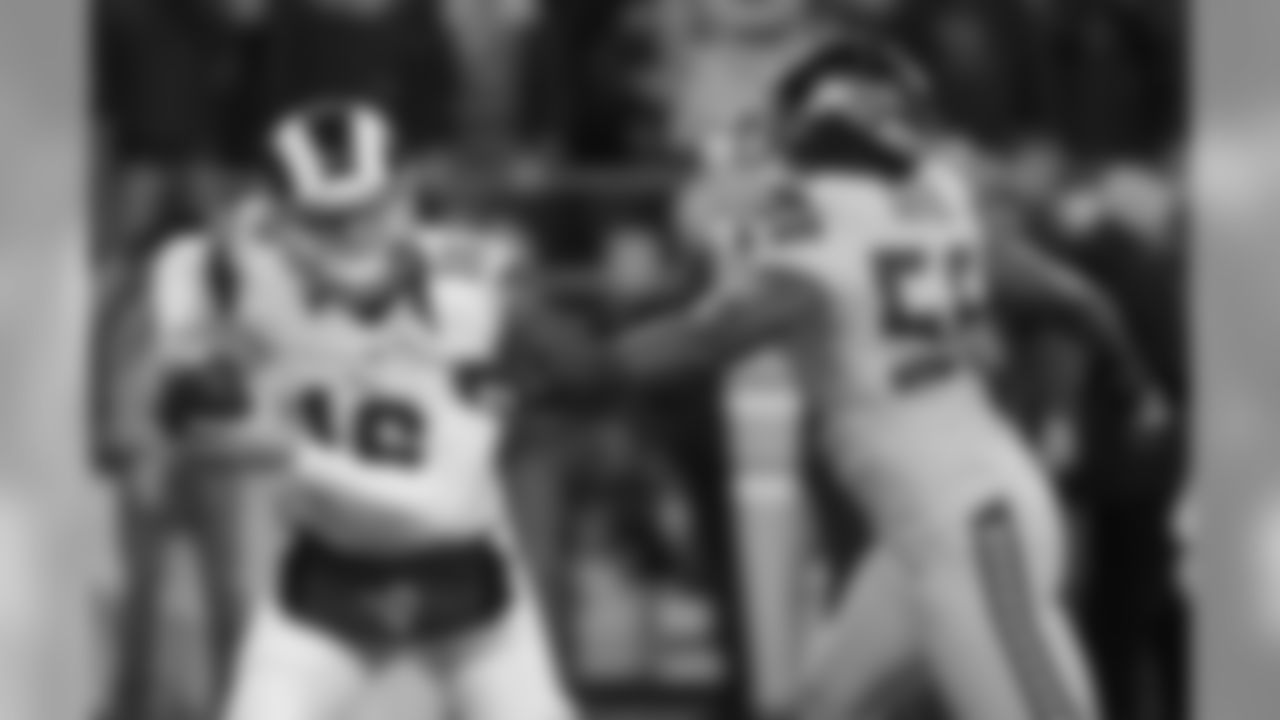 Seattle Seahawks defensive end Cliff Avril Cliff Avril, right, pressures Los Angeles Rams quarterback Jared Goff in the first half of an NFL football game, Thursday, Dec. 15, 2016, in Seattle. (AP Photo/Elaine Thompson)