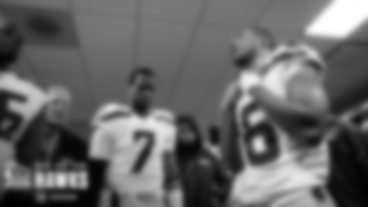 Seahawks captain Tyler Lockett speaks to the team before they leave the locker room for kickoff.