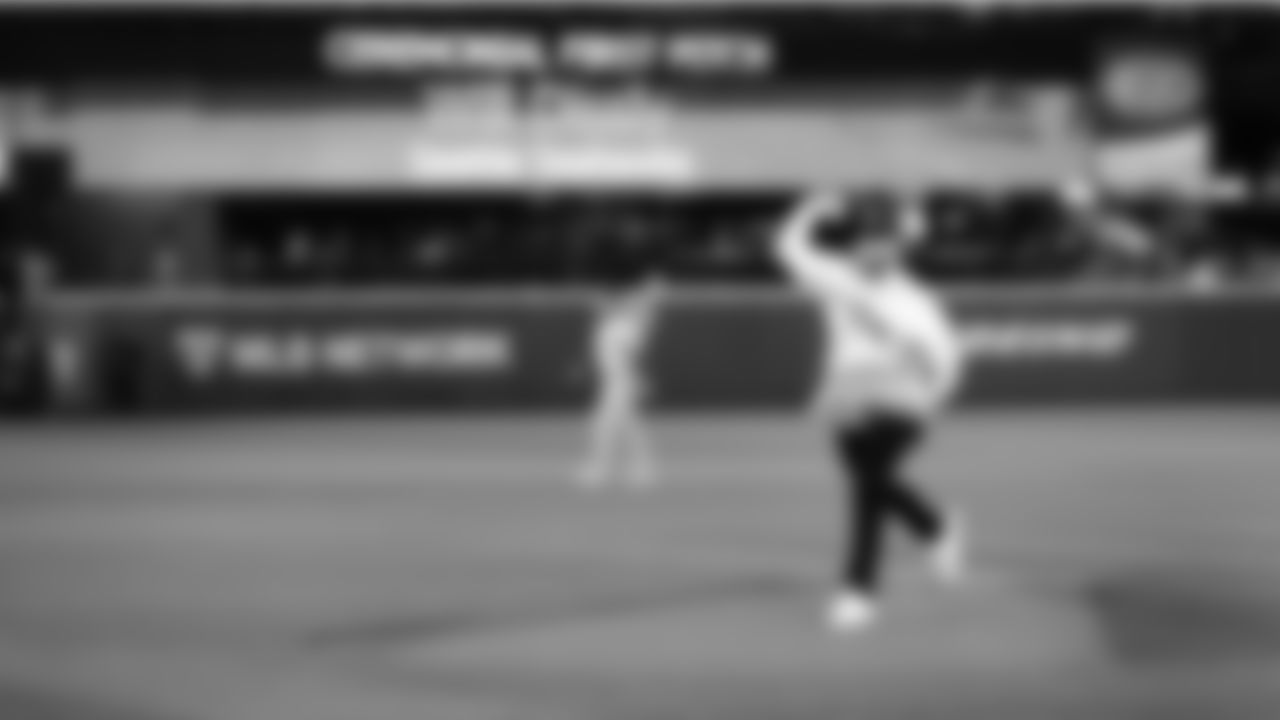 Seattle Seahawks tight end Will Dissly throws out the ceremonial first pitch at the Seattle Mariners game on April 21, 2022 at T-Mobile Park.