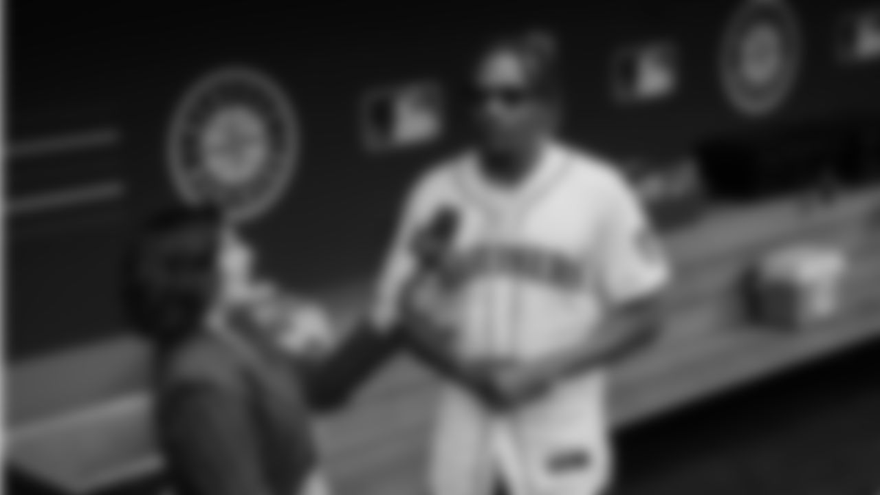 Seahawks cornerback Tariq Woolen throws out the ceremonial first pitch prior to a Mariners game at T-Mobile Park on April 23, 2023.