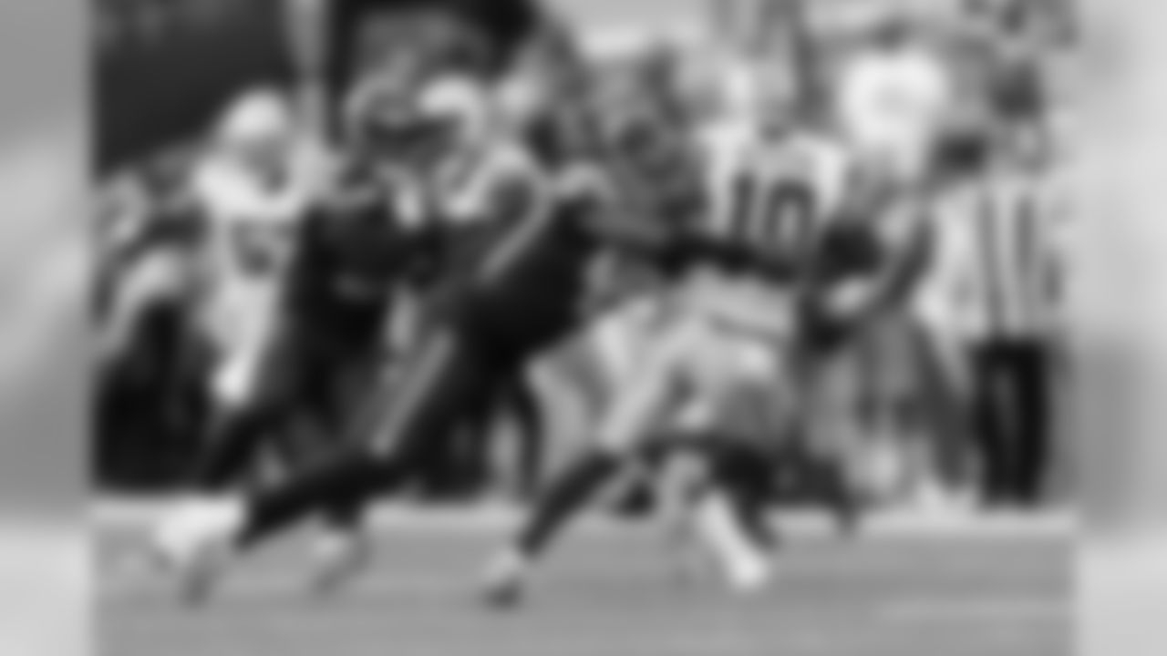 Linebacker Shaquem Griffin is the first man downfield and makes a tackle on Cowboys punt returner Tavon Austin.