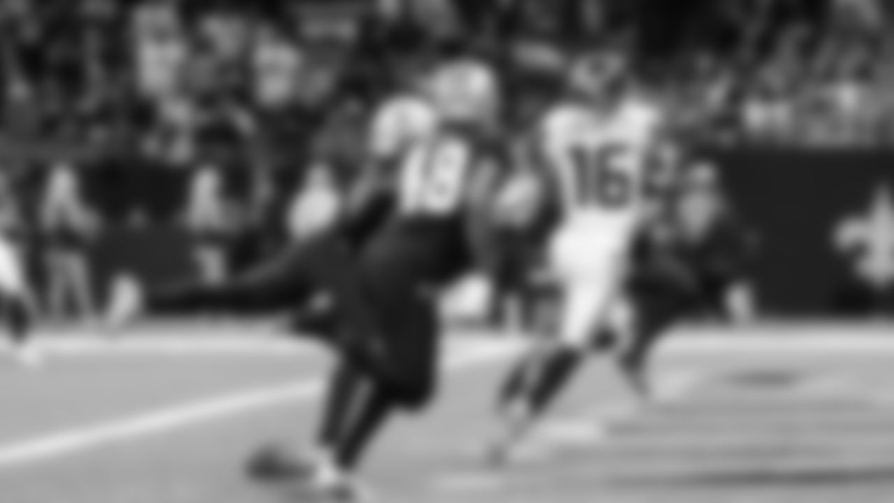 Seattle's Tyler Lockett catches the first of two touchdown passes from Geno Smith.