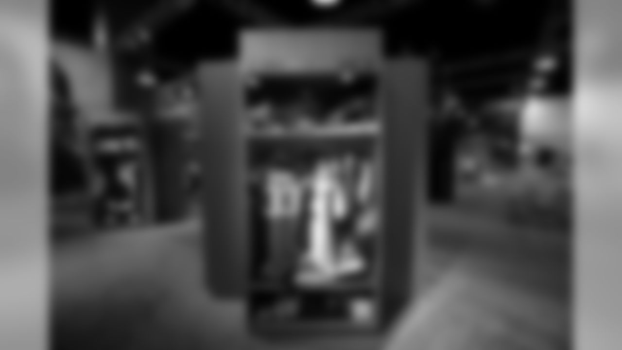 A detail view of the locker of New York Jets safety Jamal Adams (33) is on display at the NFL Experience which serves as a backdrop for the NFL Super Bowl LIV football game between the San Francisco 49ers against the Kansas City Chiefs, Monday, Jan. 27, 2020, in Miami Beach, Fla. (Scott Boehm via AP)