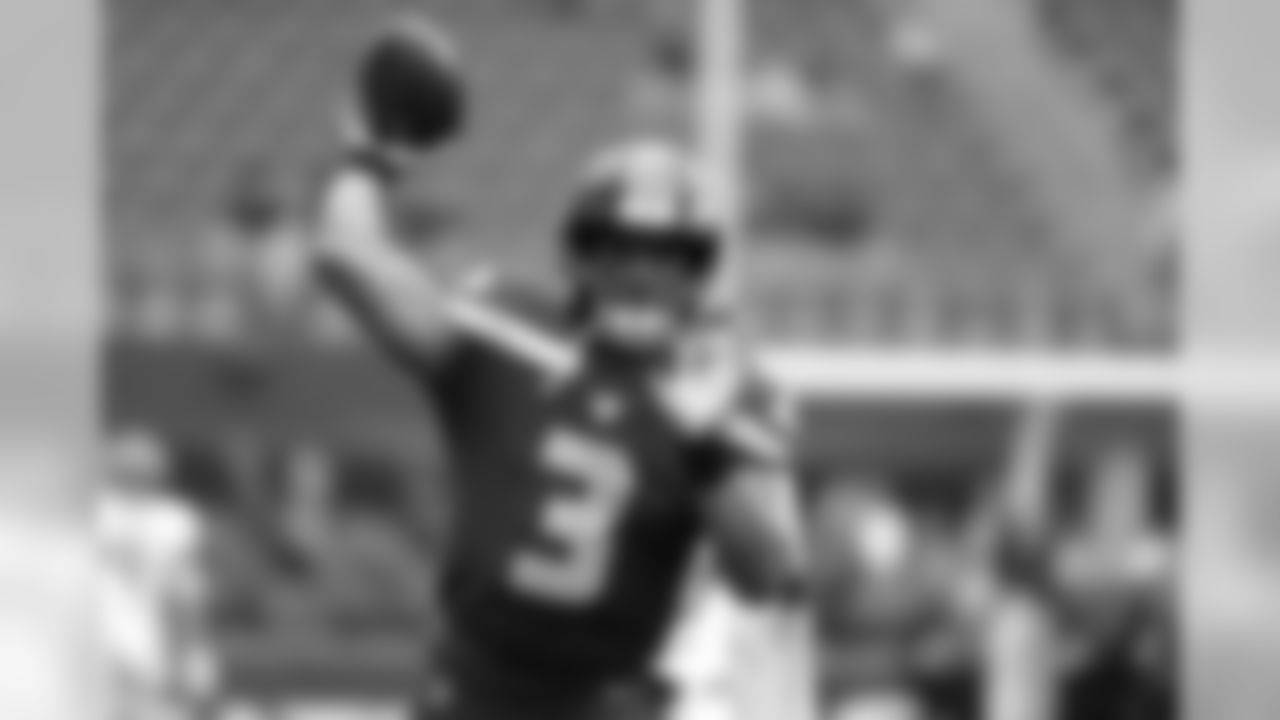 Seattle Seahawks quarterback Russell Wilson warms up for the team's NFL football preseason game against the Denver Broncos, Thursday, Aug. 8, 2019, in Seattle. (AP Photo/Elaine Thompson)